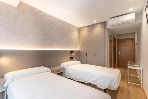 Foto de una habitación de EightRooms La Rioja Pension