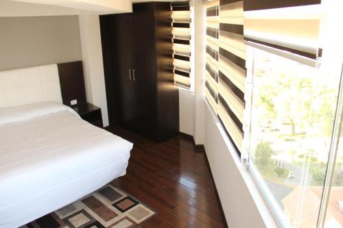 Foto de una habitación de Apart Hotel Regina