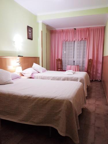 Foto de una habitación de Hostal Ponte Dos Santos