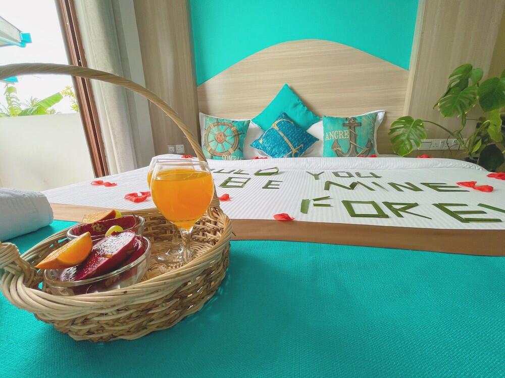 Foto de una habitación de Hotel Aquzz Inn &amp;amp; Spa