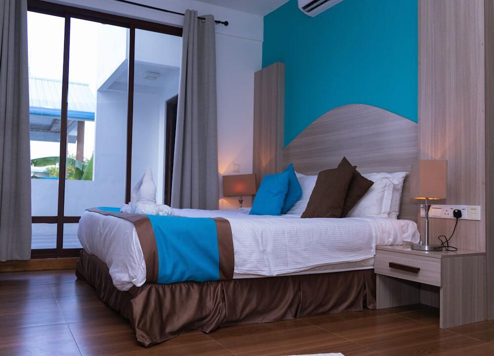Foto de una habitación de Hotel Aquzz Inn &amp;amp; Spa
