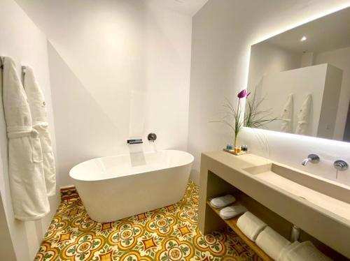 Foto del baño de Hotel Boutique Can Pocovi
