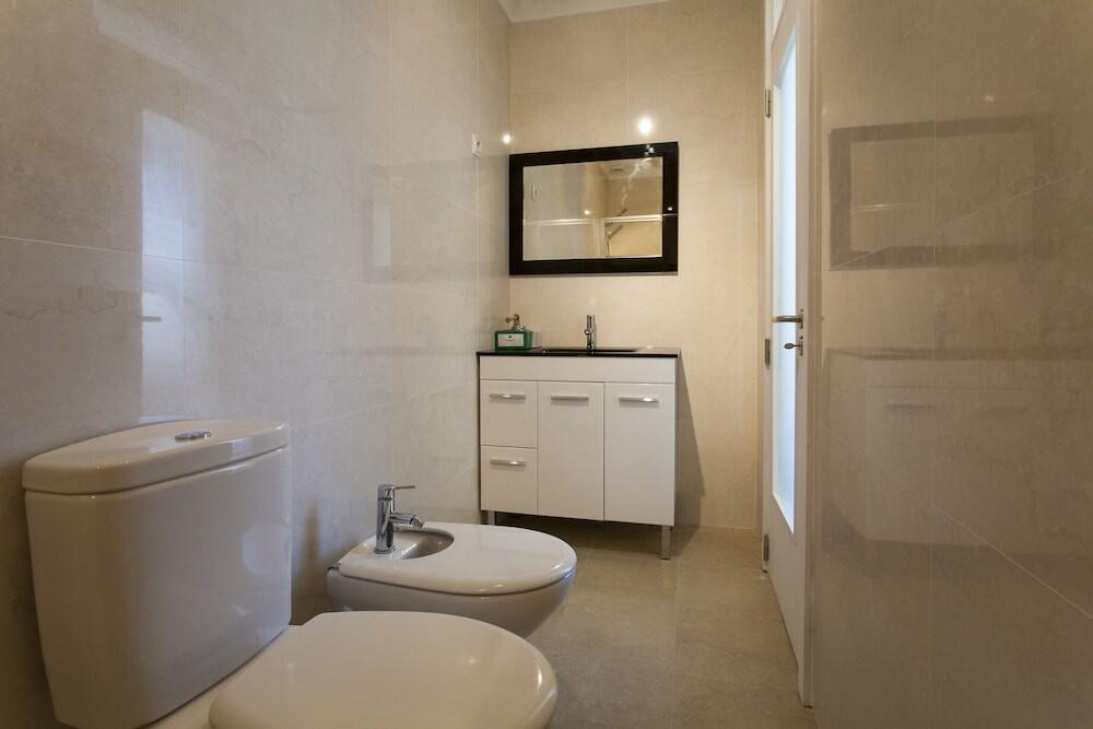Foto del baño de Hotel SANTA JUSTA SUITE BY HOMING