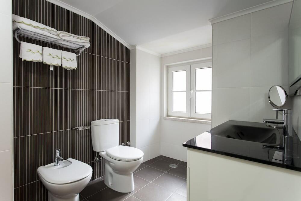 Foto del baño de Hotel SANTA JUSTA SUITE BY HOMING