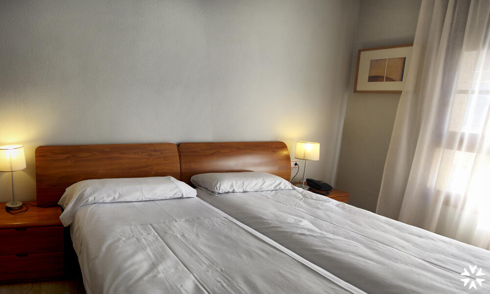 Foto de una habitación de Aparthotel Los Girasoles