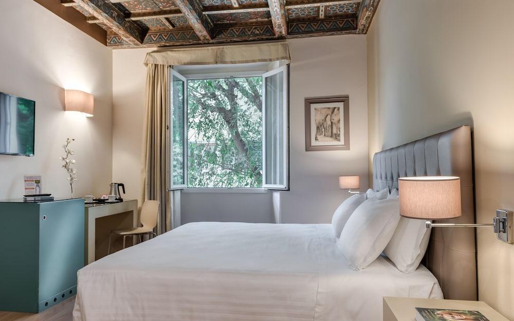 Foto de una habitación de Hotel La Fortezza