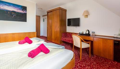 Foto de una habitación de Hotel Schomacker