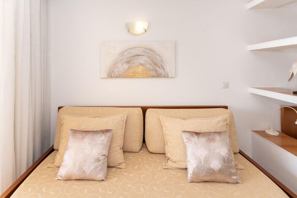 Foto de una habitación de Apartamentos María Cristina Beach