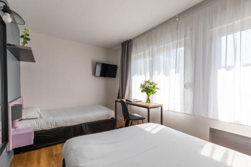 Foto de una habitación de Atlantic Hôtel Rennes Centre Gare