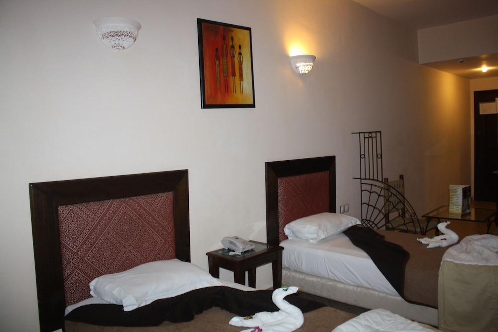 Foto de una habitación de Agyad Maroc Appart-Hotel
