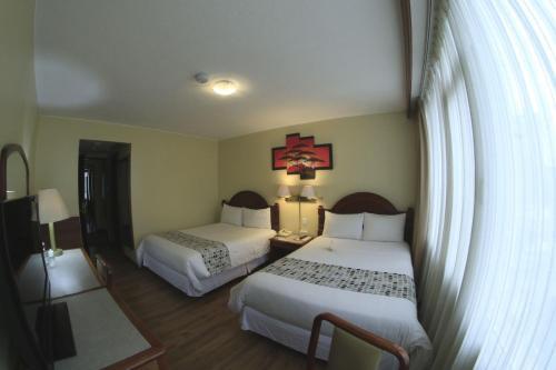 Foto de una habitación de Hotel Republica