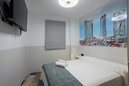 Foto de una habitación de Apartamentos MUNDOBOOKING Centro Levante
