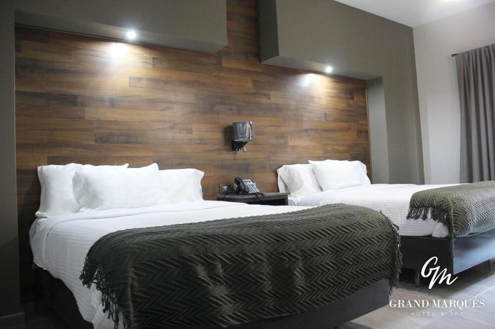Foto de una habitación de Hotel Grand Marques