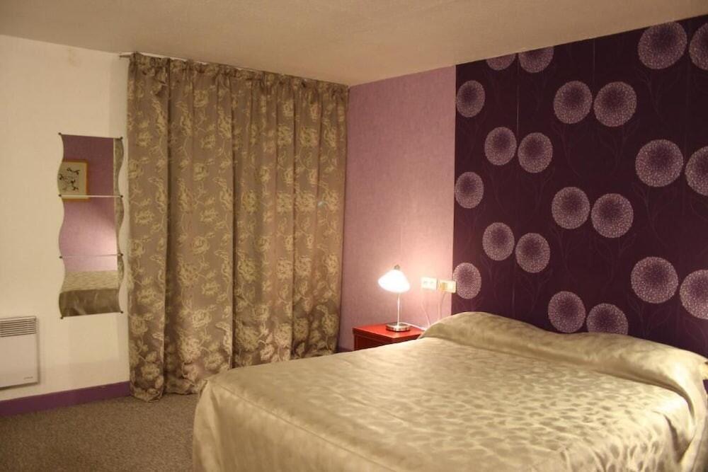 Foto de una habitación de Hotel Bomotel