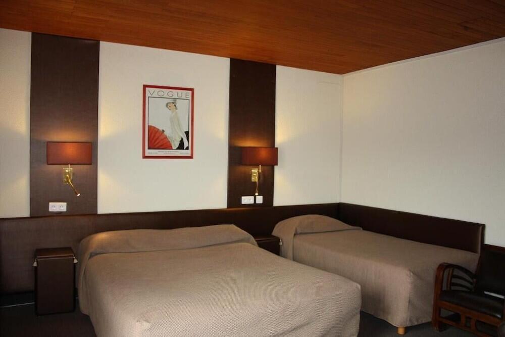 Foto de una habitación de Hotel Bomotel
