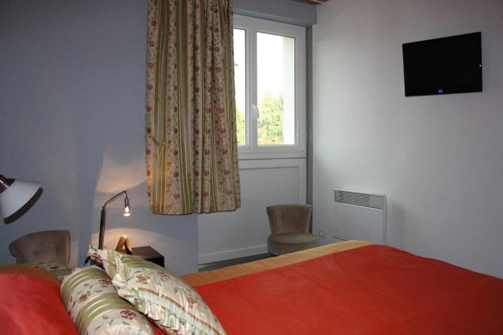 Foto de una habitación de Hotel Bomotel
