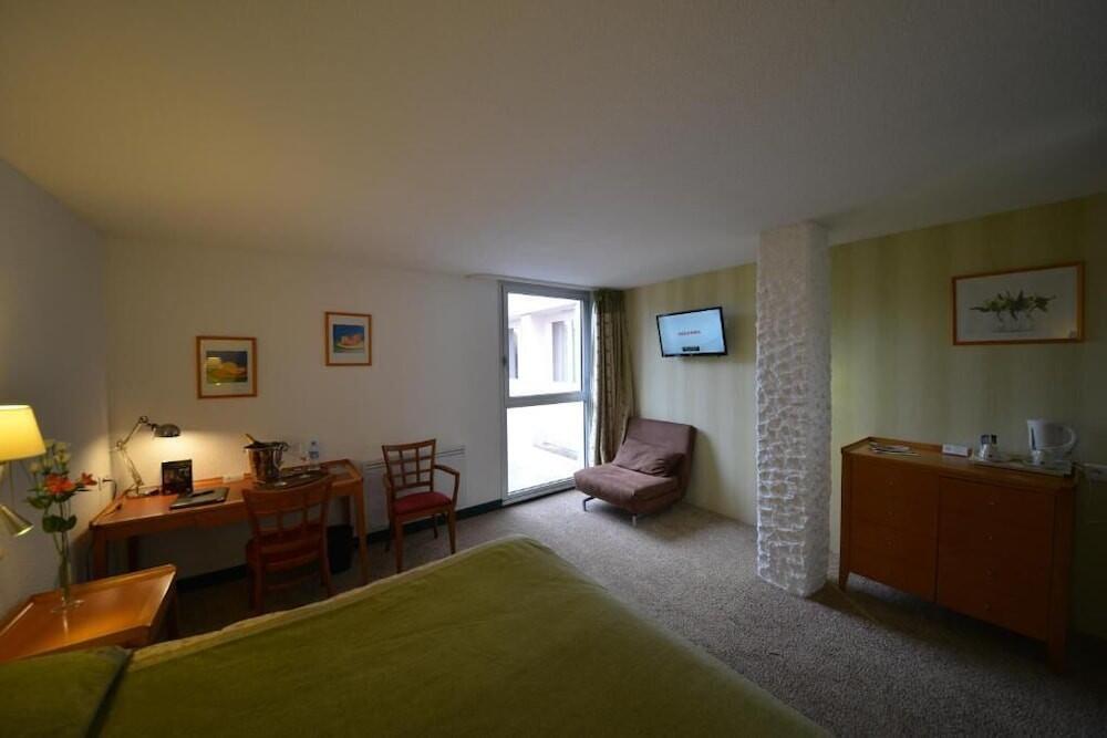 Foto de una habitación de Hotel Bomotel
