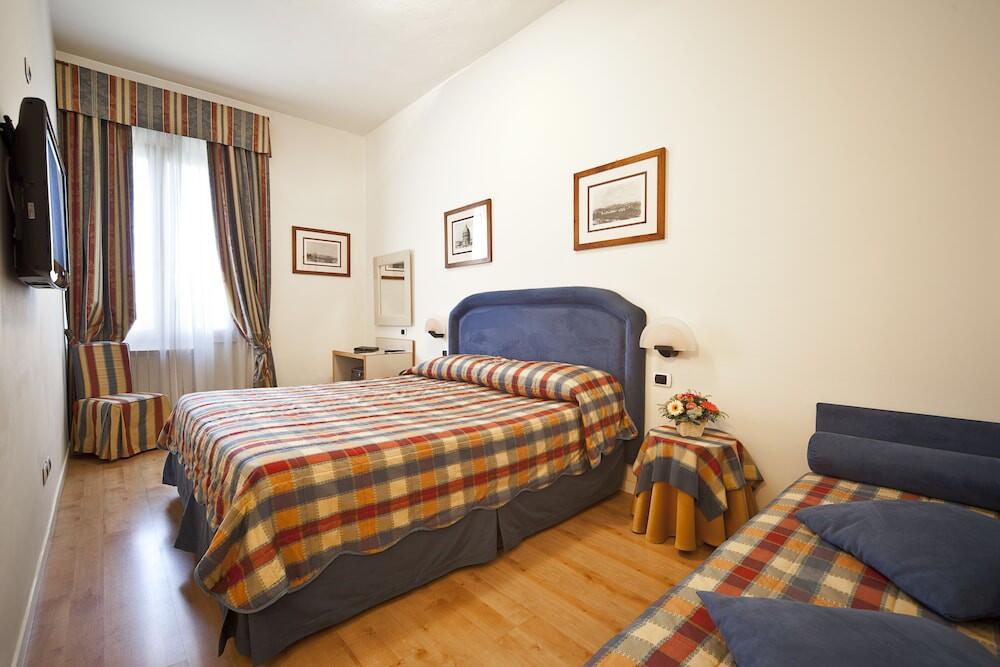 Foto de una habitación de Hotel Italia