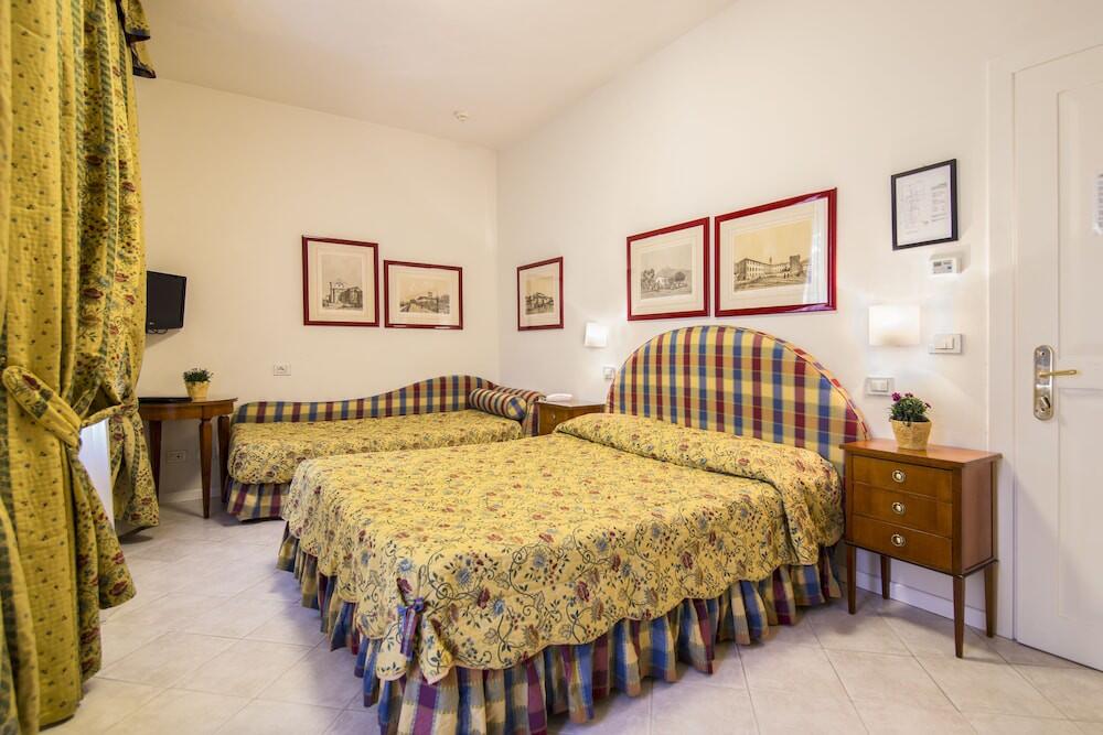 Foto de una habitación de Hotel Italia