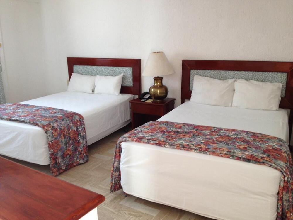 Foto de una habitación de Hotel Suites Costa Cancun
