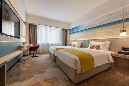 Foto de una habitación de Hotel Ausotel Smart Zhujiang Newtown Guangzhou