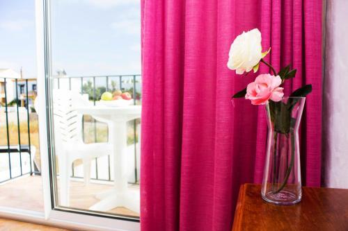Foto de una habitación de Hotel Oasis Atalaya