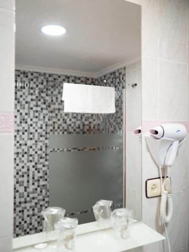 Foto del baño de Hotel Quino