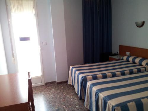 Foto de una habitación de Hotel Costa San Antonio