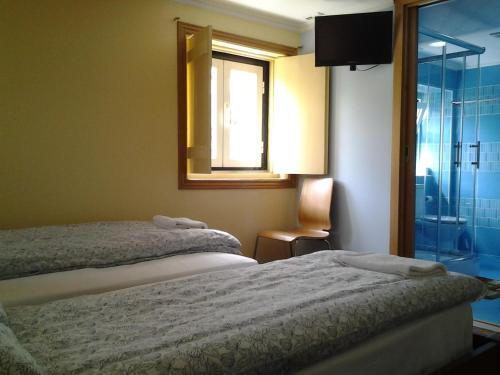 Foto de una habitación de Baixa GuestHouse