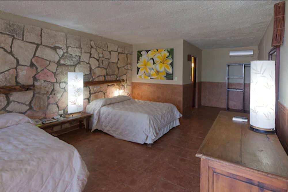 Foto de una habitación de Hotel Blue Angel Resort