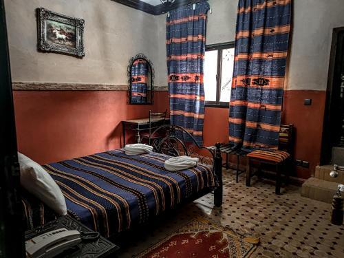 Foto de una habitación de Hotel La Kasbah