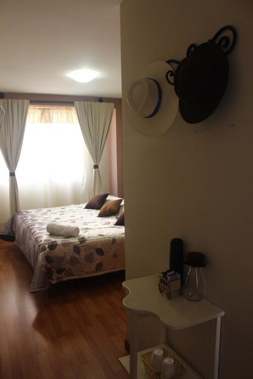 Foto de una habitación de Hotel La Mansion Del Sol