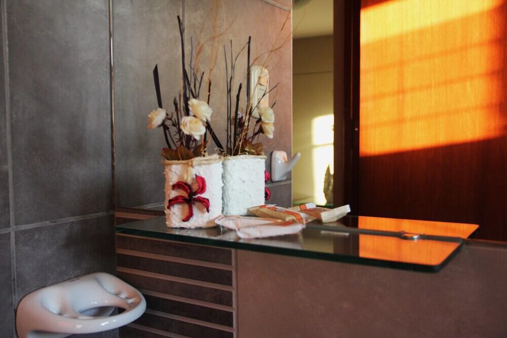 Foto del baño de Hotel La Mansion Del Sol