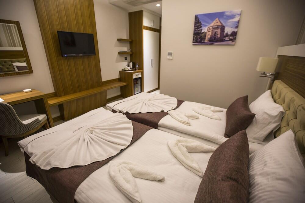 Foto de una habitación de Honour Hotel