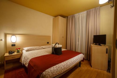 Foto de una habitación de Hotel Cepina Albergo Incantato