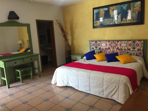 Foto de una habitación de Hotel Montroi Express