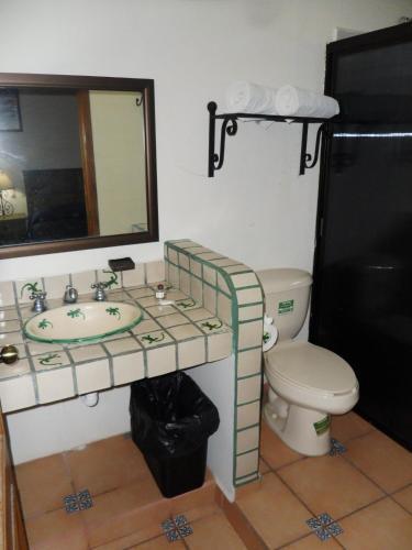 Foto de una habitación de Hotel Montroi Express