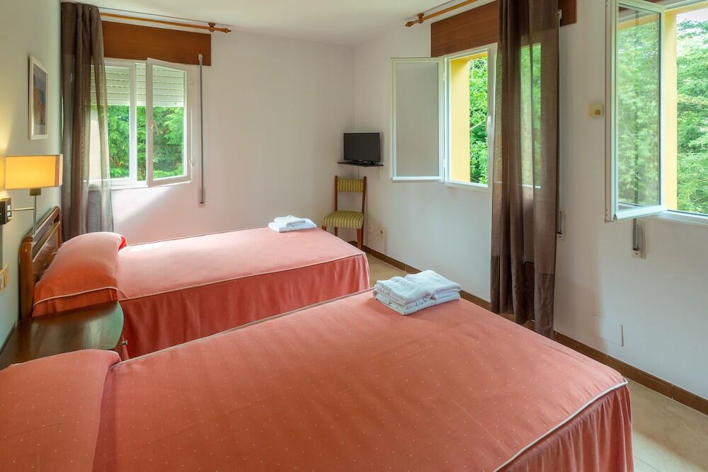 Foto de una habitación de Hotel La Xungueira