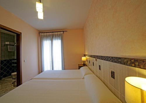 Foto de una habitación de Hostal Rural El Tejar