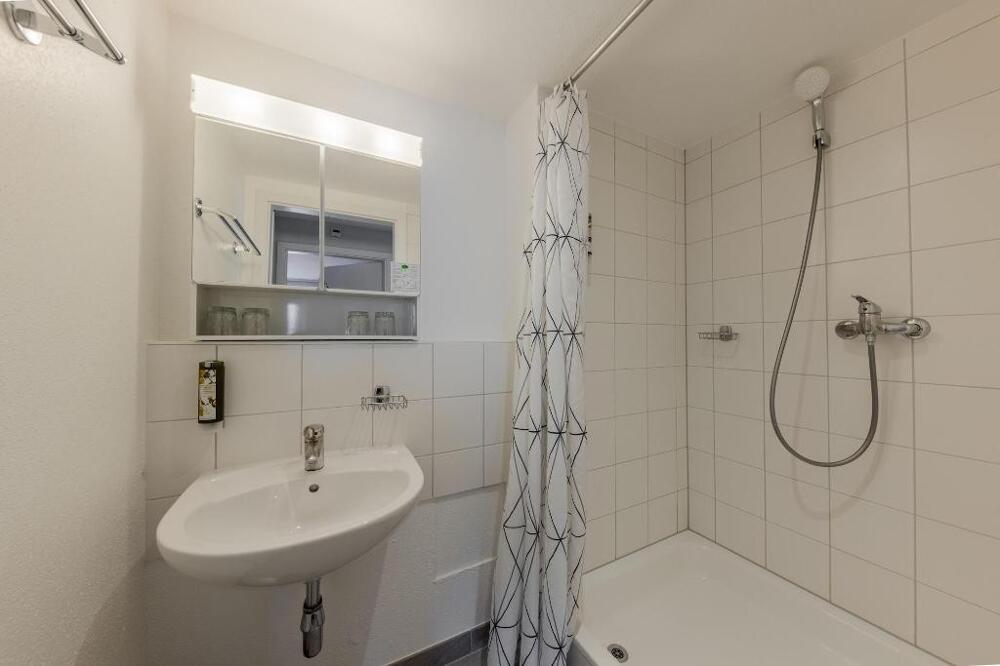 Foto del baño de Villars Lodge