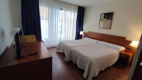 Foto de una habitación de Hotel Suite Camarena