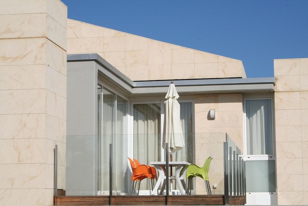 Foto de una habitación de Aparthotel L&amp;#039; Escala Resort