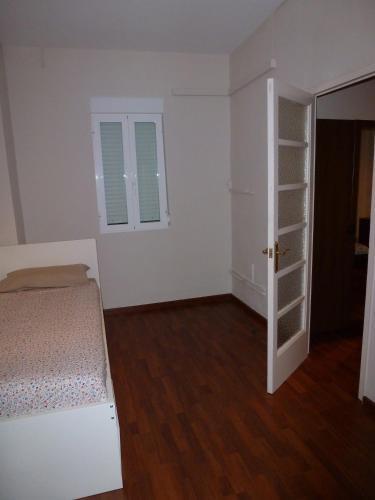 Foto de una habitación de Apartamentos Turia