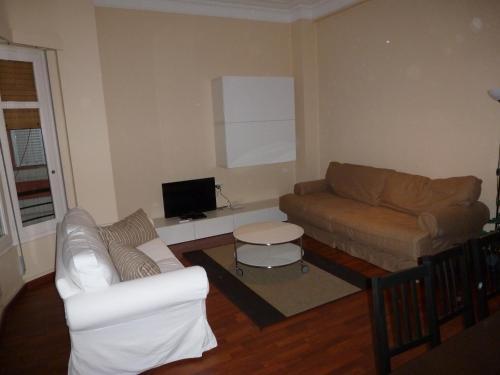 Foto de una habitación de Apartamentos Turia