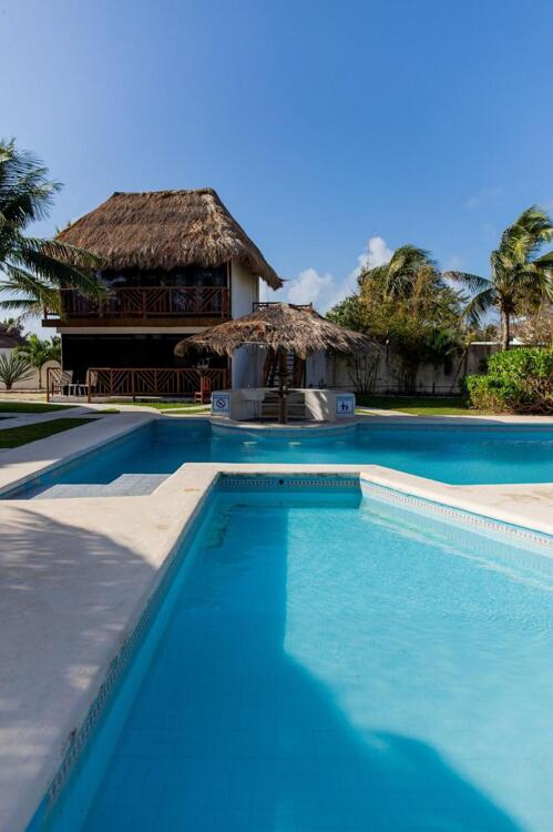 Foto del exterior de Capital O Hotel Arena Beach Club