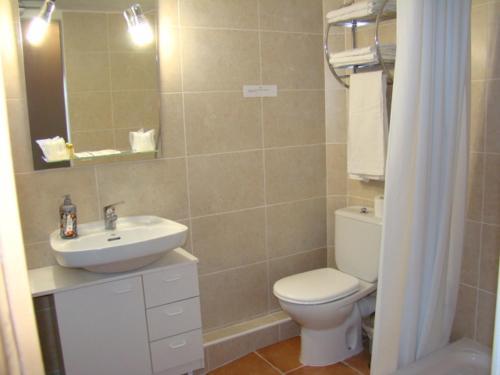 Foto del baño de Hostal Platja