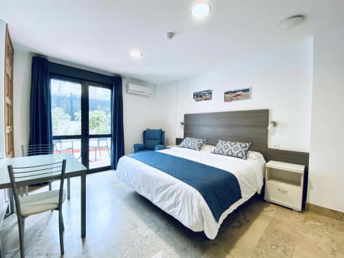 Foto de una habitación de Hotel Apartamentos Marina Luz