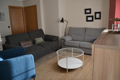 Foto de una habitación de Tres Puentes Anguiano Apartamentos &amp;amp; Habitaciones