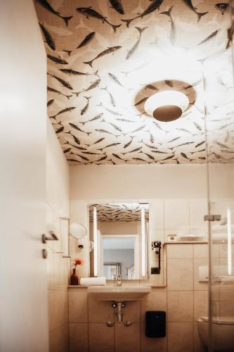 Foto del baño de Villa Bosco - Digitales Boutiquehotel