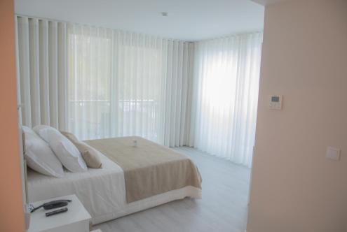 Foto de una habitación de Calamar Hotel